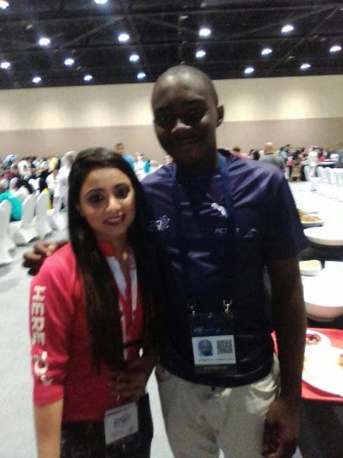 With a fellow delegate during the exhibition.